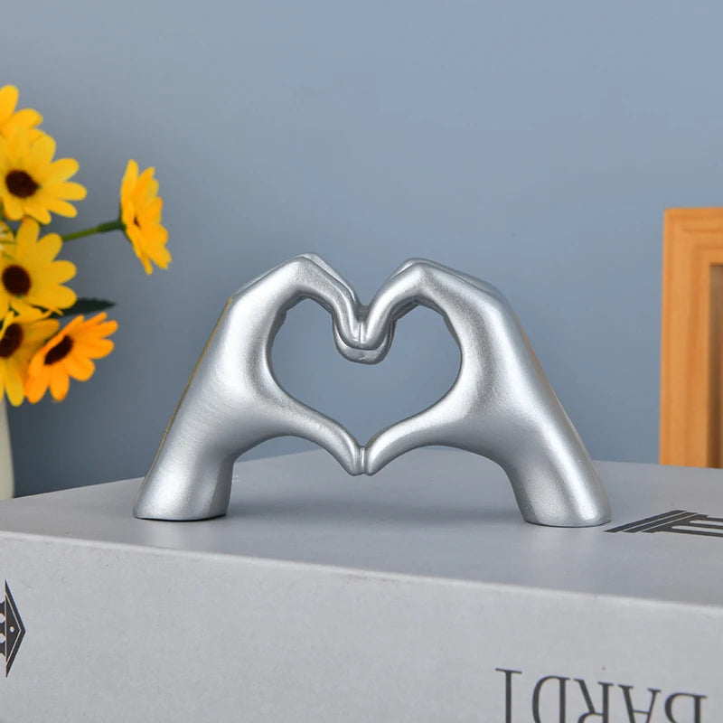 Gold Heart Hand Gesture Sculpture