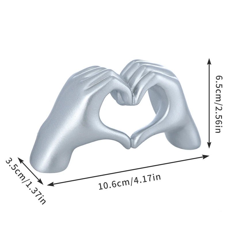 Gold Heart Hand Gesture Sculpture